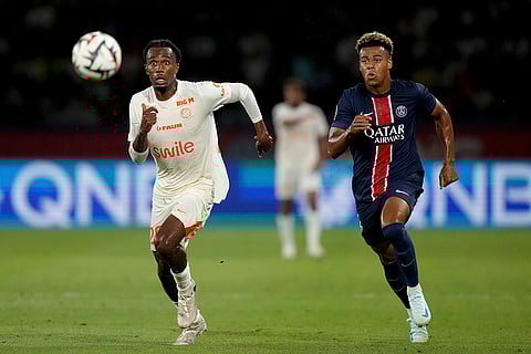 League 1, Paris Saint-Germain vs Montpellier: Enzo Tchato and PSG's Desire Doue, right, run after the ball
